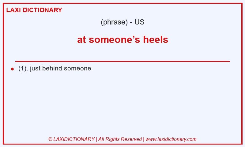 Definition at someone’s heels in American English