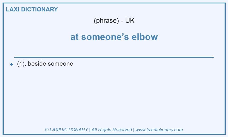 Definition at someone’s elbow in British English