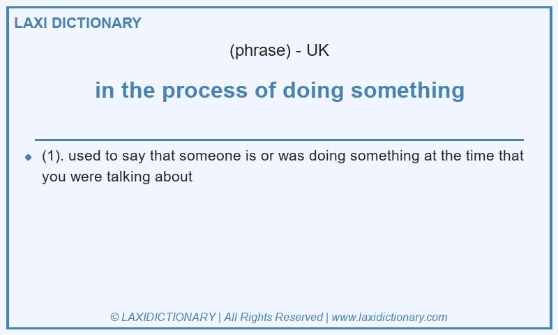 Definition in the process of doing something in British English