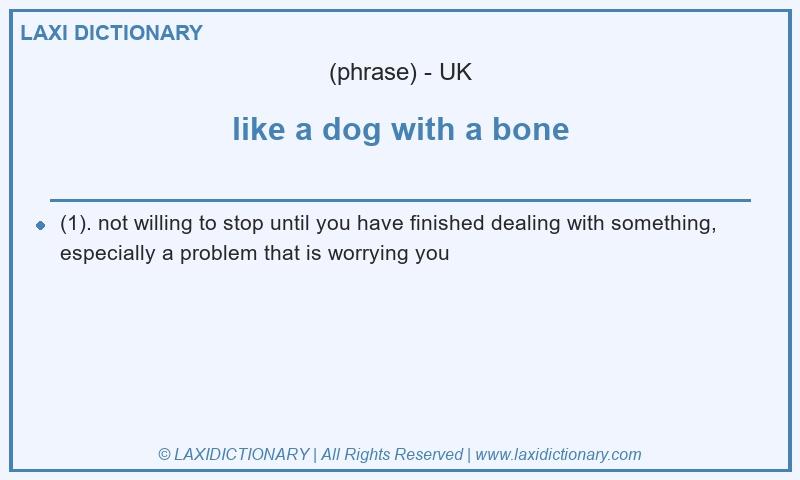 Definition like a dog with a bone in British English