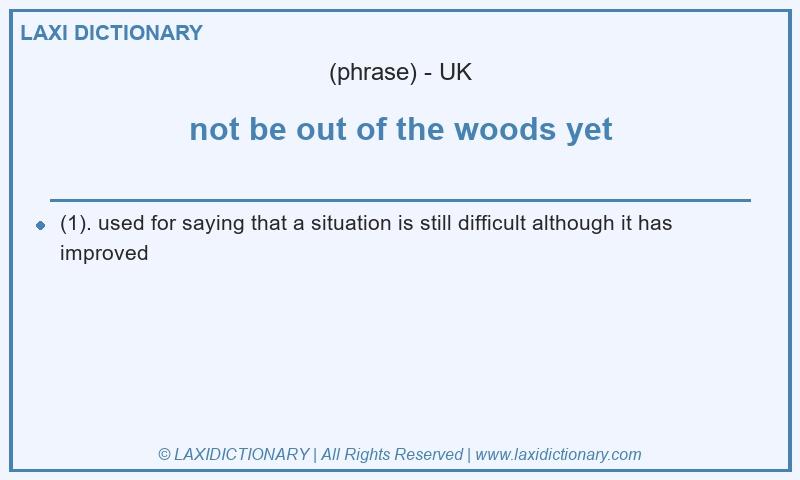 Definition not be out of the woods yet in British English