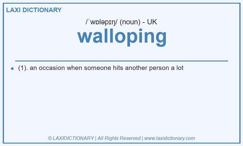 Definition walloping in British English